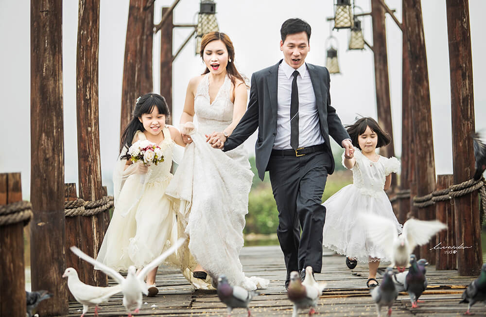 Để buổi chụp ảnh kỉ niệm gia đình ngoài trời được thuận lợi, bạn nên cân nhắc một số vấn đề. (Nguồn: Internet)