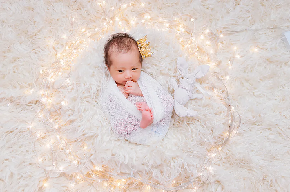 Vì sao buổi chụp newborn kéo dài Làm gì khi bé không hợp tác