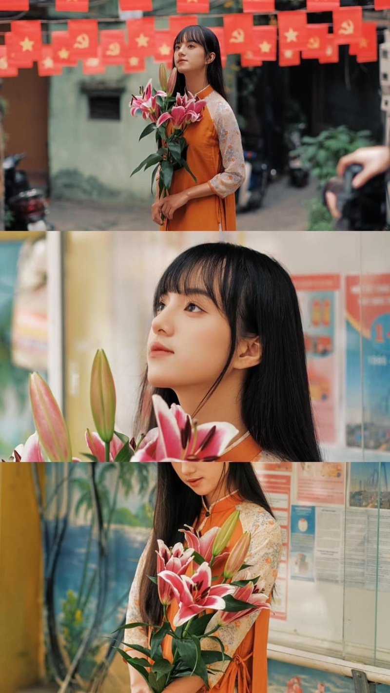 Tạo dáng chụp ảnh Tết ôm hoa trong lòng