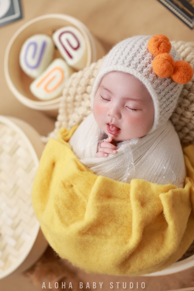 Khăn quấn và nhộng chũn - phụ kiện chụp hình cho bé newborn phổ biến