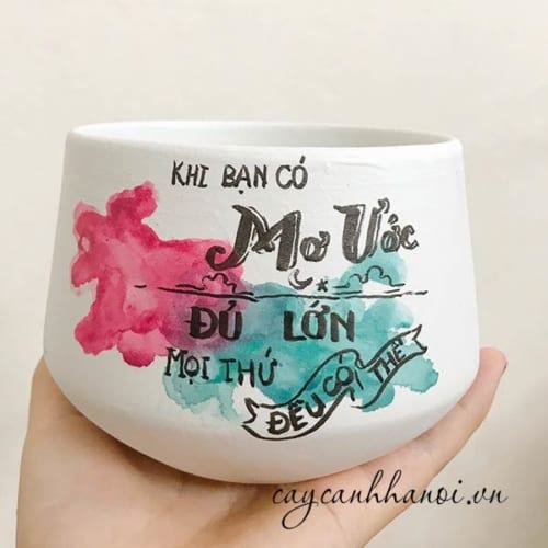 Chậu cây cảnh với slogan khi ban ước mơ đủ lớn