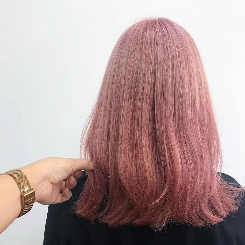 Một chút sắc cam sẽ tạo nên điểm nhấn hoàn hảo cho mái tóc hồng pastel