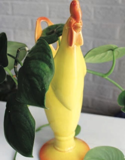 This rooster planter was a vase, but with a drainage hole drilled in the bottom, it makes a perfect planter.