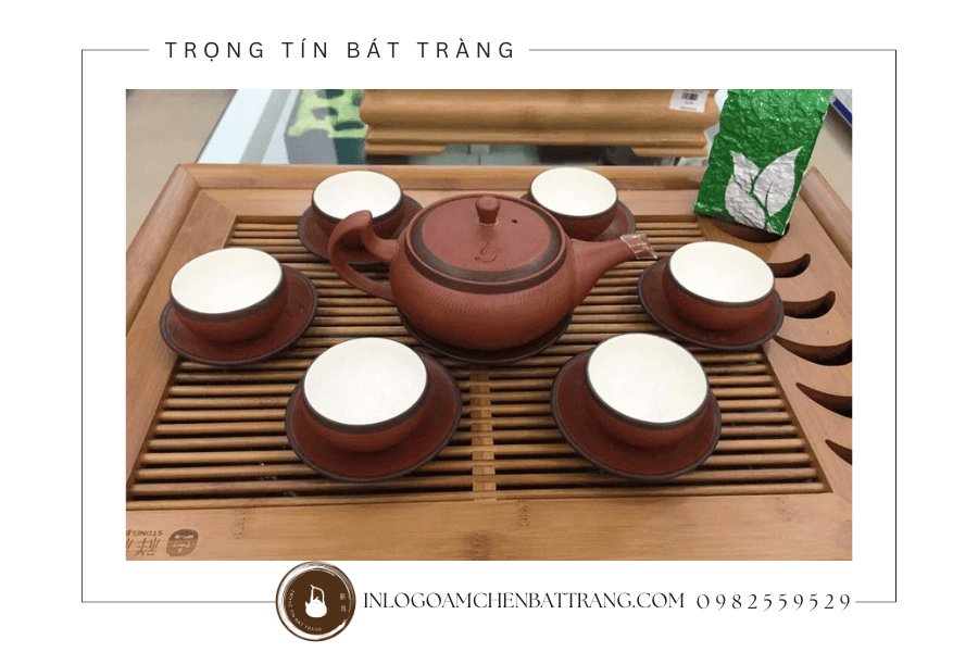 In logo lên ấm chén tử sa, hồng sa, men vuốt tay