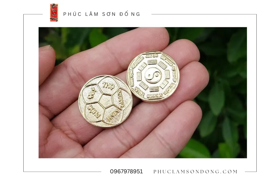 đồng xu phong thuỷ may mắn