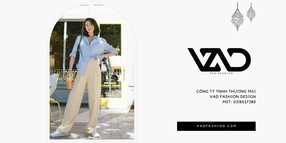 Outfit du lịch Hong Kong khi phối áo sơ mi cách điệu cùng với quần tây ống suông